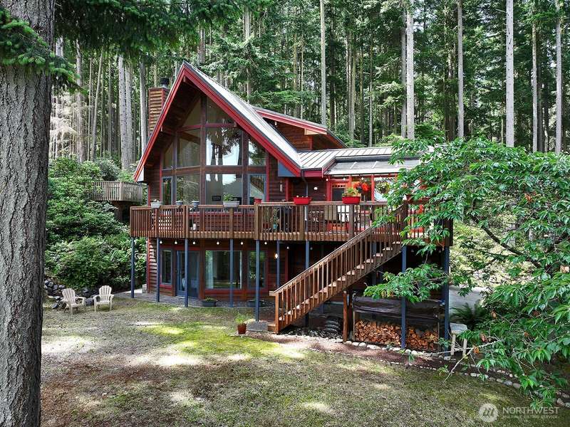 Welcome to your own island sanctuary! Three levels of light filled living with an abundance of windows. This is the eastern side of your home.