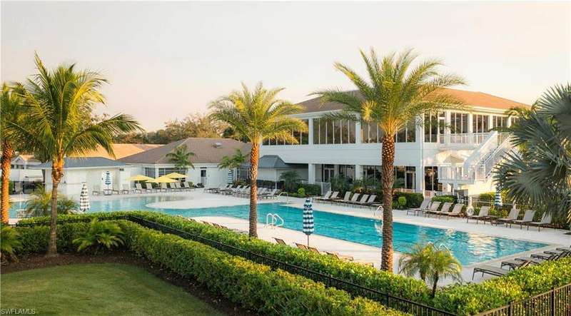 Community pool with a patio area