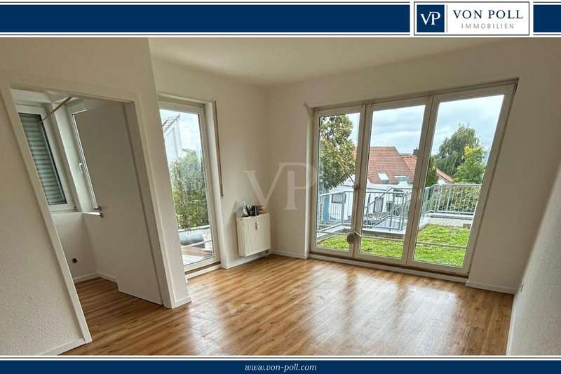 Schöne 3 Zi - Wohnung mit Terrasse und Gartenanteil