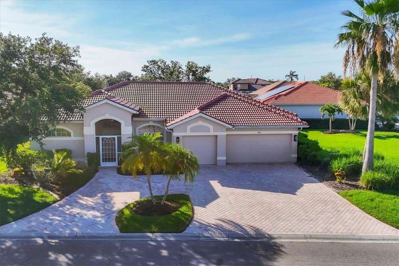 large three car garage and circular driveway