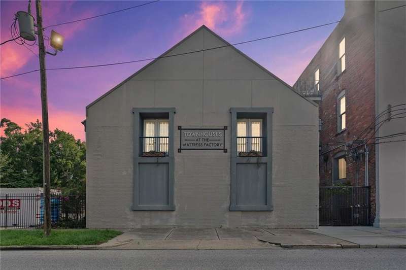 View of front of house with brick siding