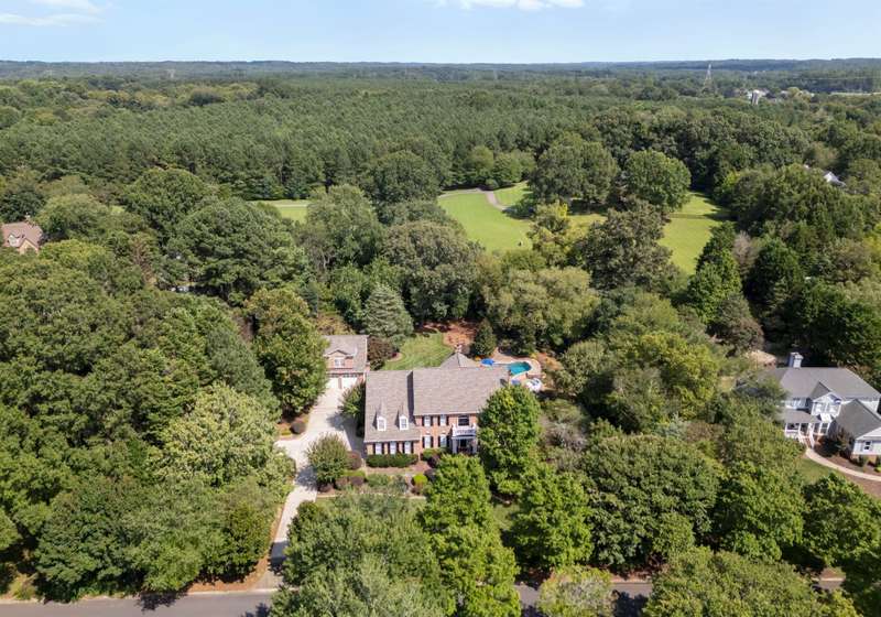 Over one acre of mature landscaping and complete privacy