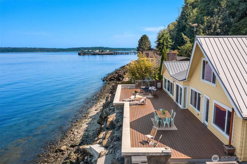 Epic year-round views from your spacious Trex deck. If the weather isn't agreeable, you can still enjoy the views from most of the rooms inside the home. Seattle skyline in the distance.