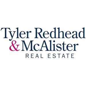 Tyler Redhead & McAlister Real Estate Logo