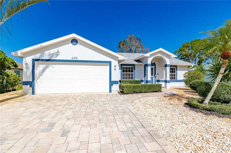 Adorable home with paver driveway