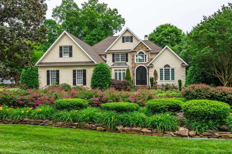 Lovely landscaped front elevation view