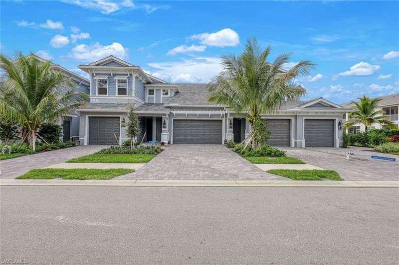 View of front of home featuring a garage