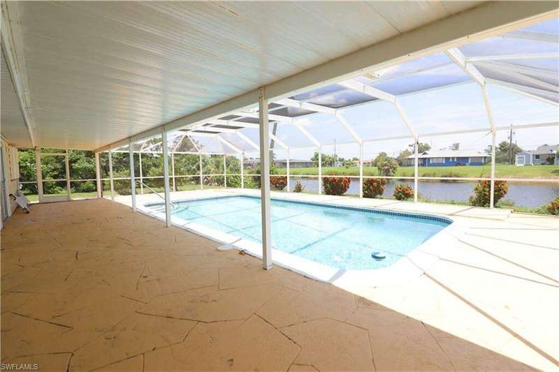 View of pool featuring a lanai and a patio