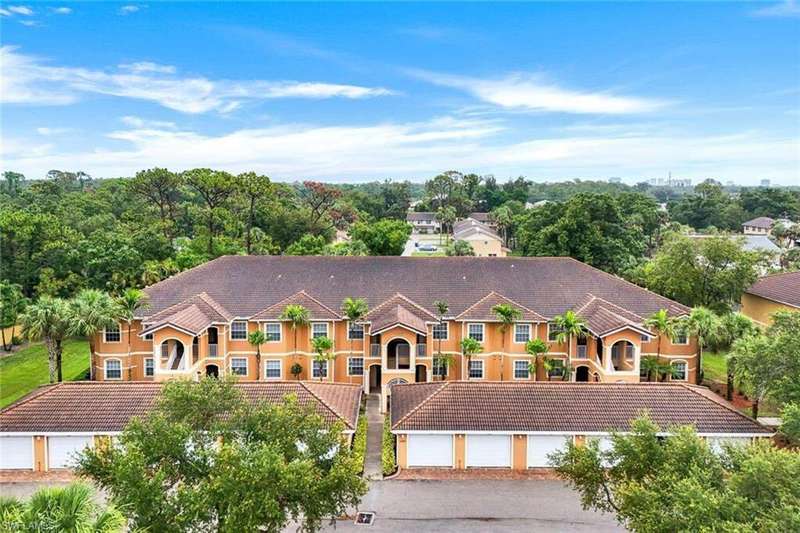 Garage directly in front of front door of Condo