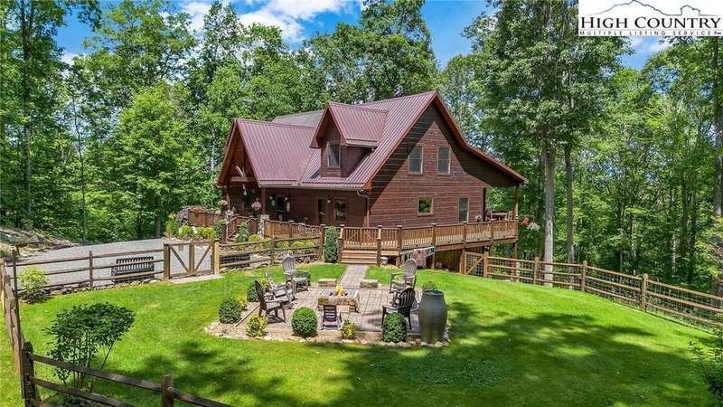 A fenced, level yard is ideal for pets and play. F