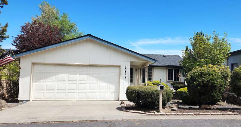 Welcome to 63738 Cascade Village Drive!