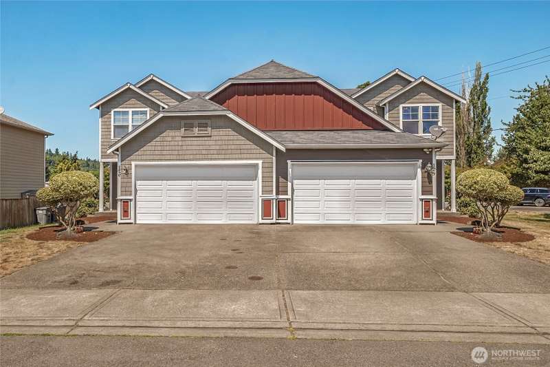 A well-maintained duplex with great curb appeal on an oversized lot.
