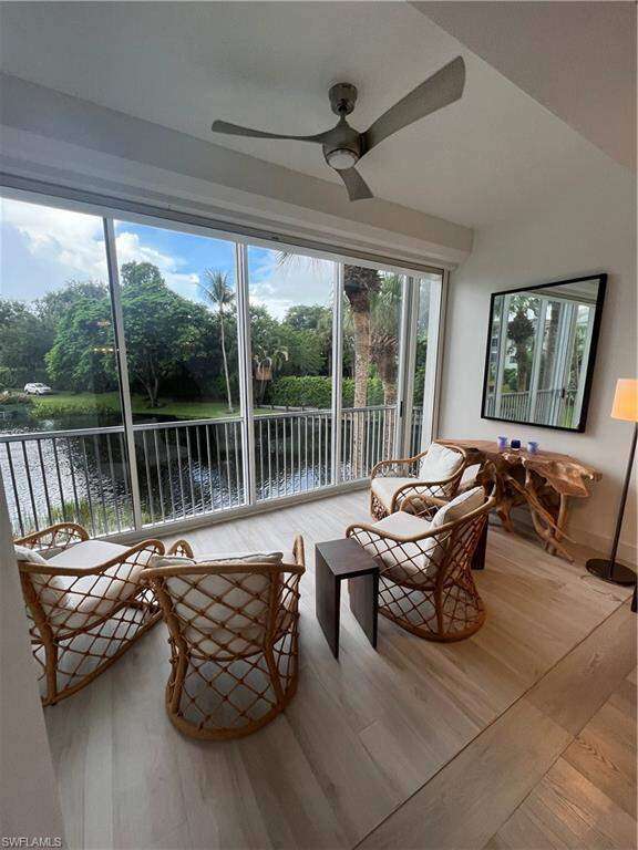Sunroom with ceiling fan