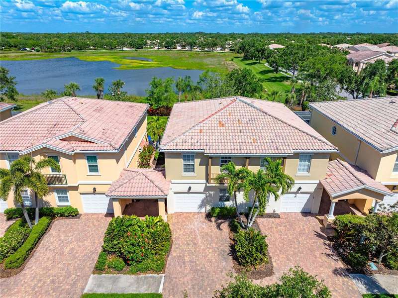 Located lakeside in the award-winning community of VillageWalk in Palmer Ranch