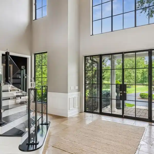 Custom Home on 6.1 Acres with Stocked Pond and Arena