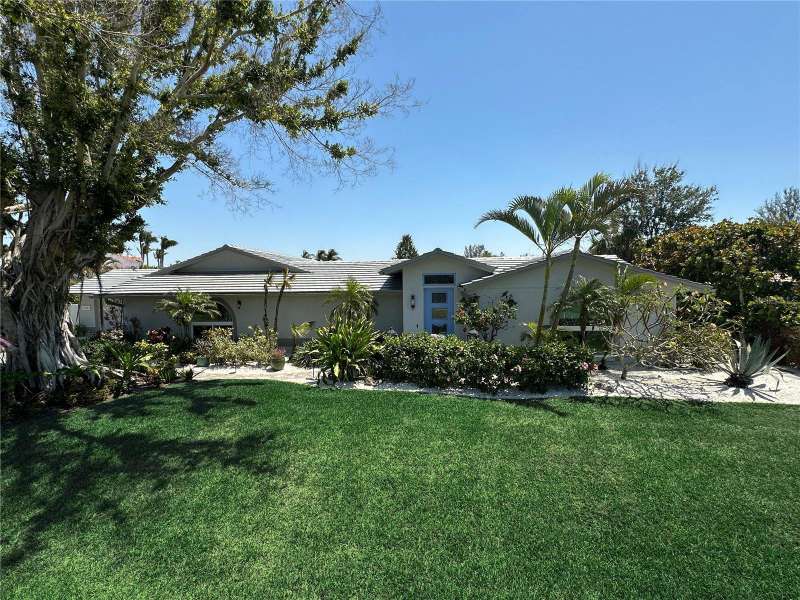 Exceptional complete remodel just 2 in from Sarasota Bay, minutes from the ICW for boating,fish, kayak or enjoy the firepit at night over the water !