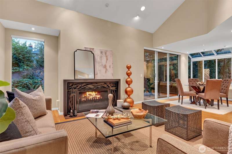Surrounded by deep, wooded greenbelt and wrapped in privacy, the 1985-built, two-story offers timeless style accented by vaulted ceilings and open spaces