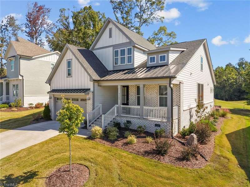 Welcome to 5180 Whaitley Lane in the Montrose Village community of Grandover.