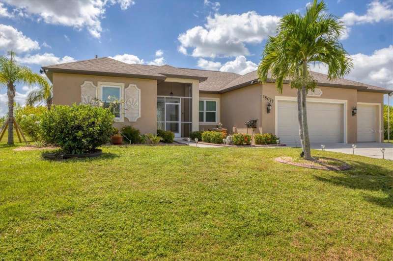 15077 Acorn Circle, Port Charlotte FL 33981, 2044 square feet, 3-beds, 2-baths, heated salt water pool, 3-car garage.