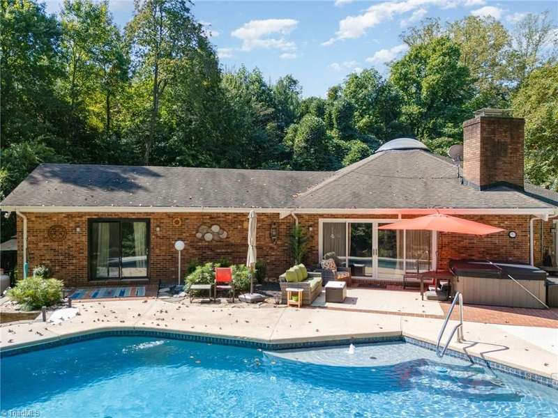 Outdoors, enjoy a hot tub, large patio & pool?perfect for relaxing or entertaining!