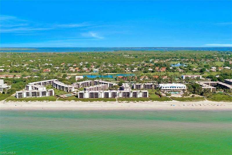 Pre Ian-Bird's eye view with a water view and a view of the beach