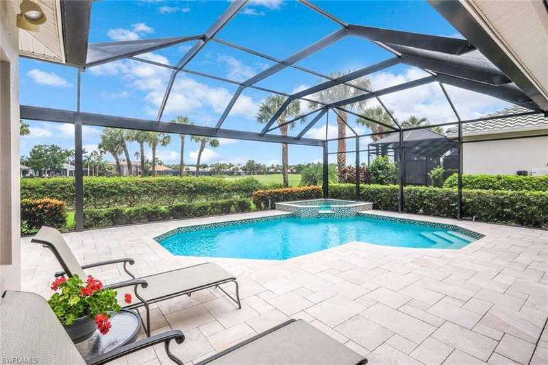Stunning Updated Pool, Cage and Leathered Marble Lanai Decking