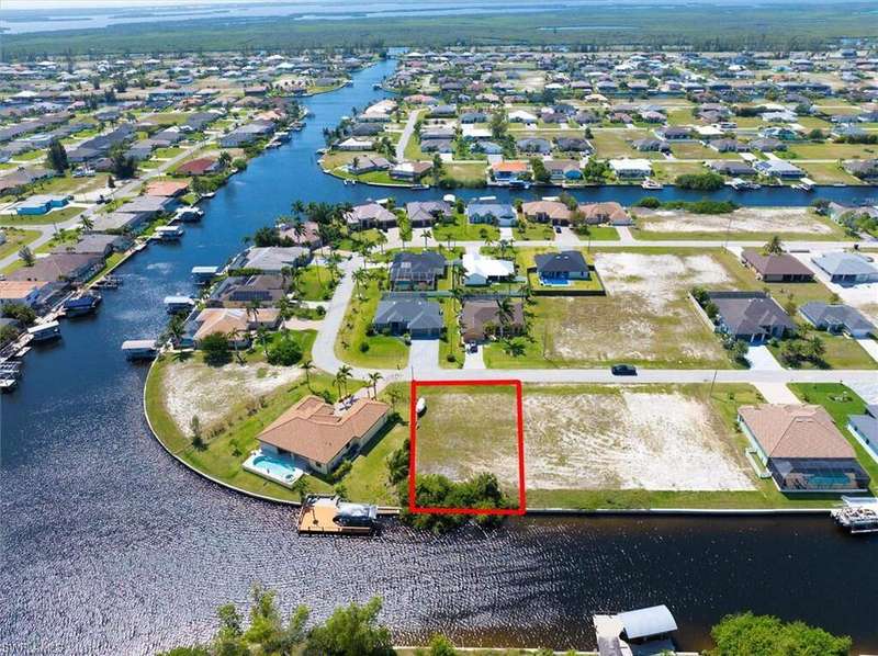 Bird's eye view with a residential view and a water view