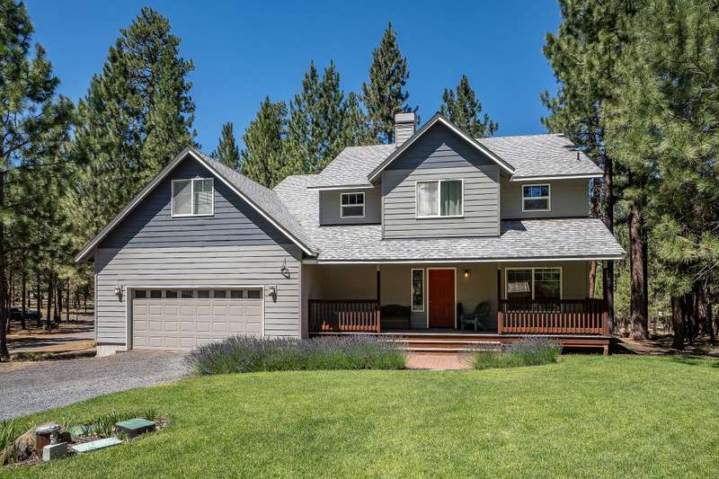 Lovely home on a Pine treed 1 acre. A lavender border welcomes you to the covered front porch
