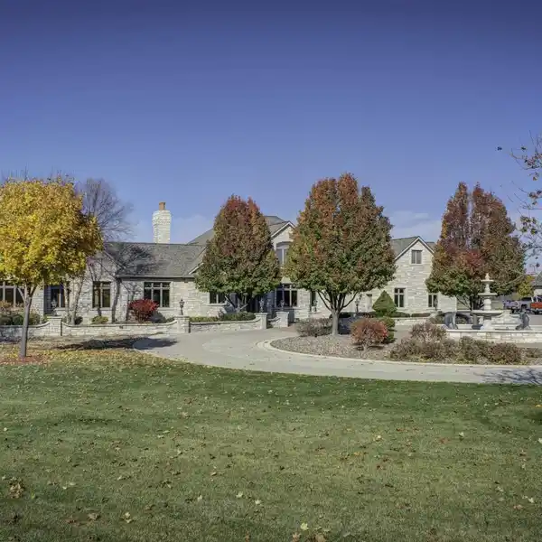 Expansive All-stone Estate with Indoor Pool and Bar