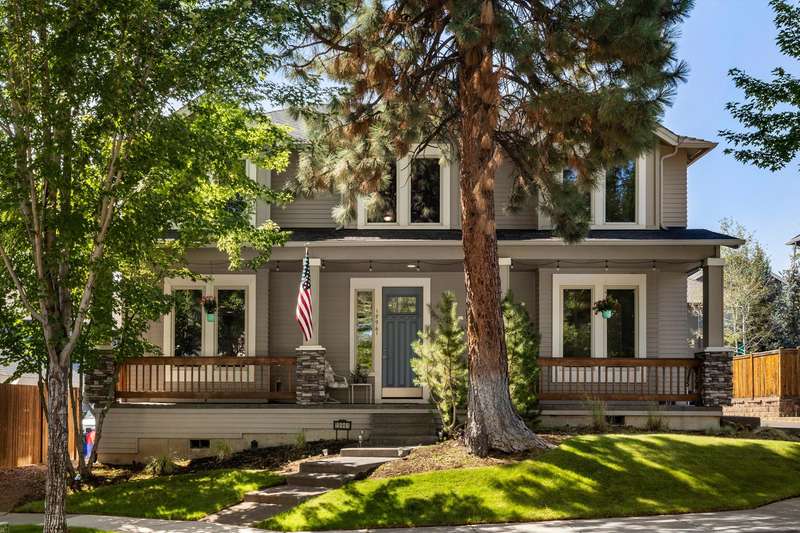 SW Bend home with full-width porch.