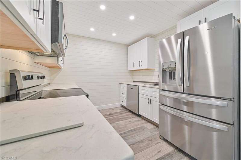 Beautiful Corian Counters, New Appliances and Cabinets