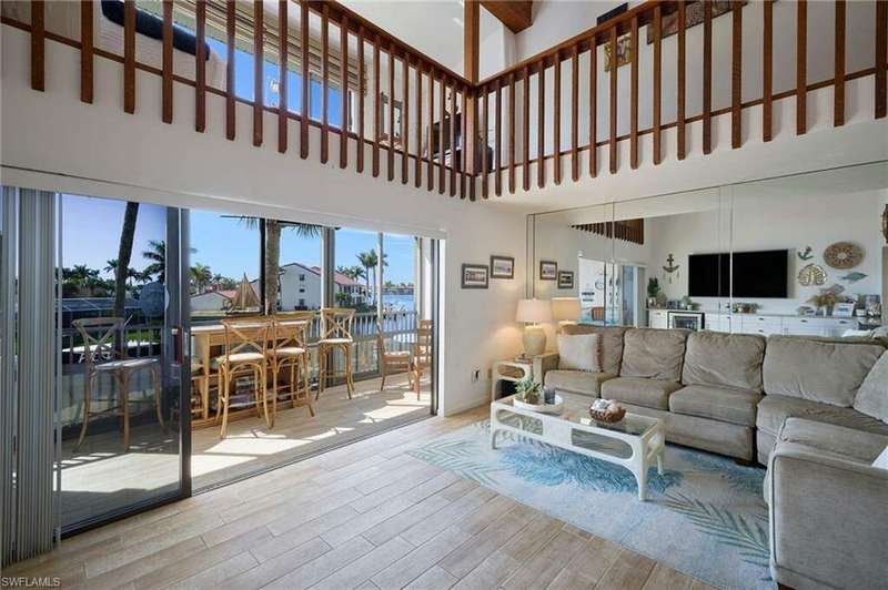 Living room with vaulted ceiling