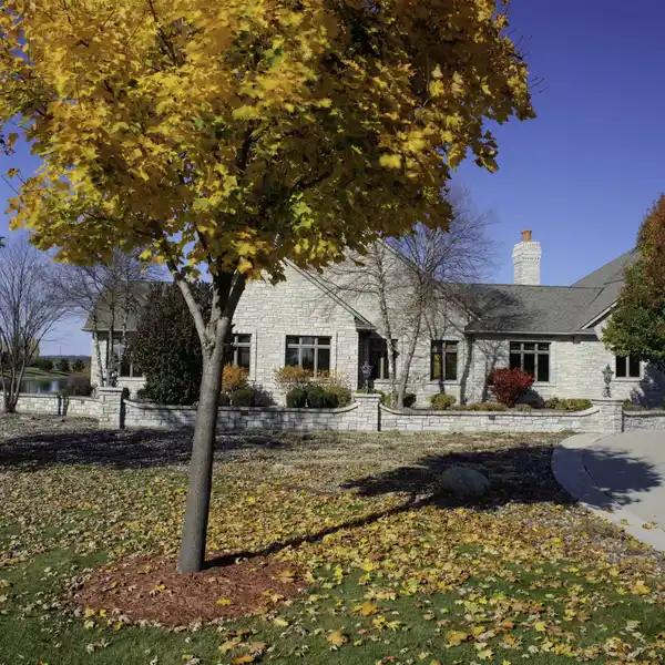 Expansive All-stone Estate with Indoor Pool and Bar