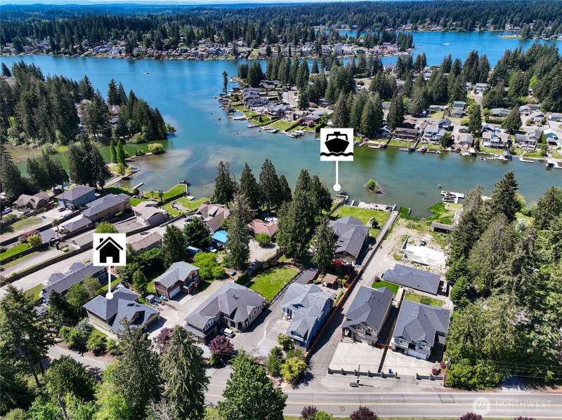 This home includes a private dock on Lake Tapps!