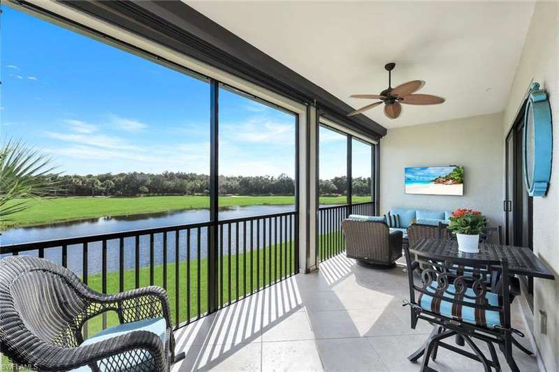 Expansive screened Lanai overlooking the lake and #2 fairway on the Talon Course.