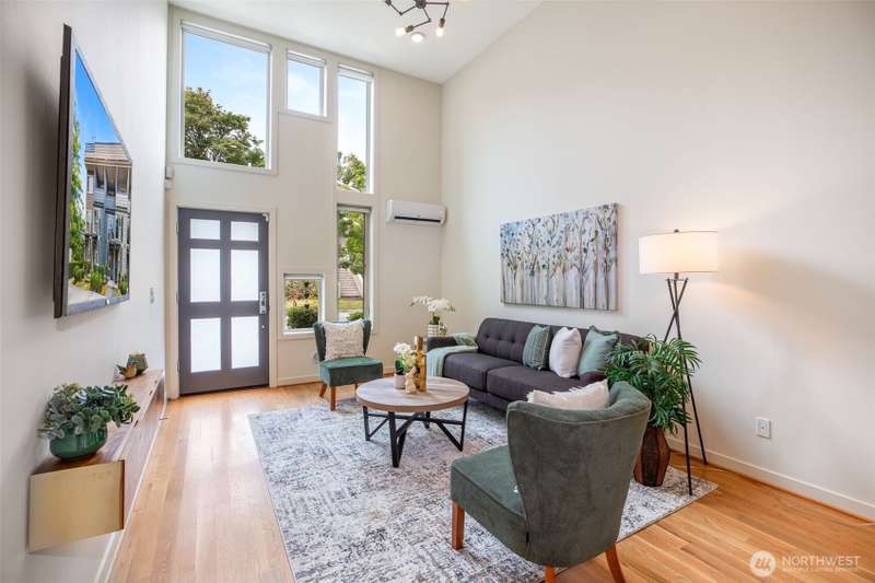 Spacious living room with hardwood floors.