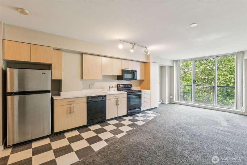Discover your peaceful escape in the city—an urban retreat with a private, tree-lined view nestled in vibrant downtown Bellevue.