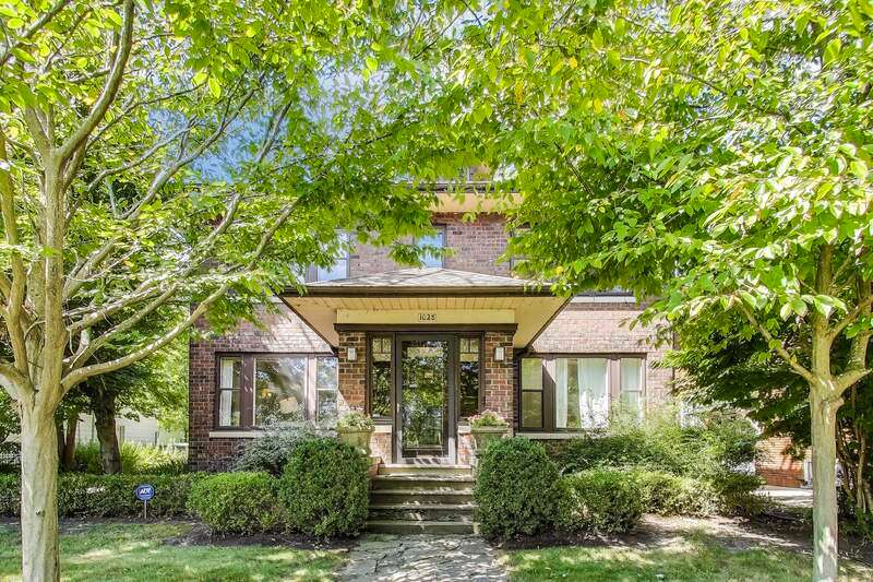 Front Exterior with detached 2 car brick garage