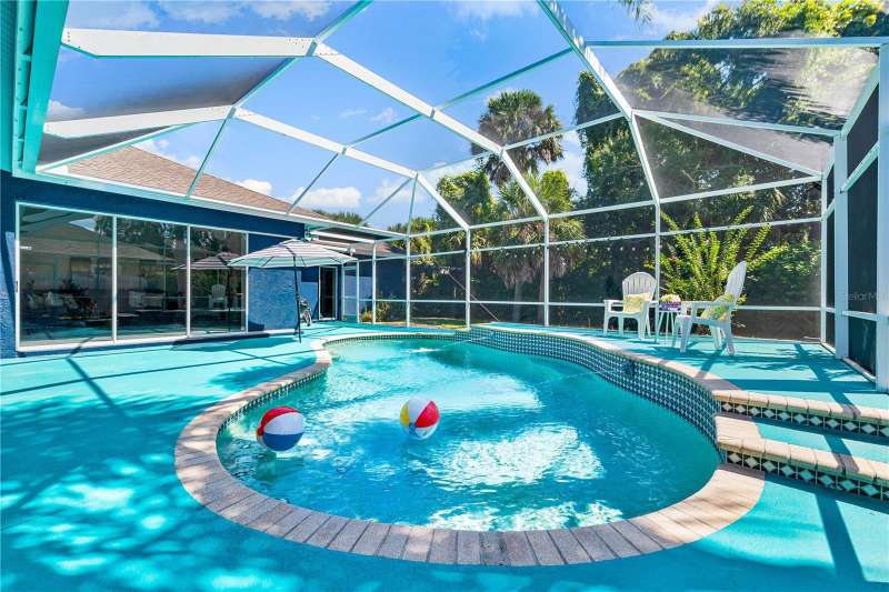 Private, single-story pool home, with seamless indoor-outdoor living.