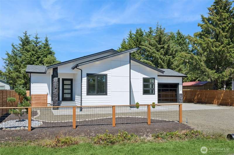 Garage door is AI generated. Similar one will be installed soon.