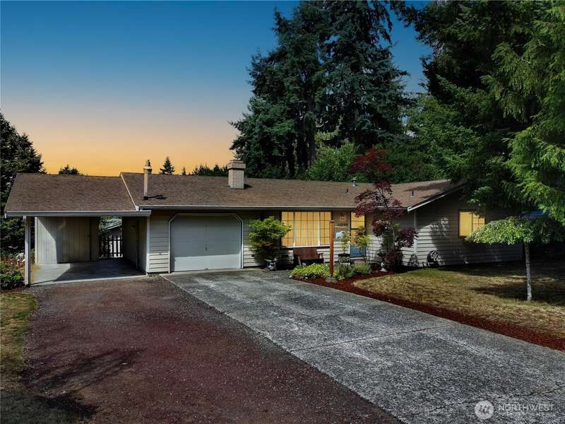 Discover the charm of Rhodes Wood in this 1,194 sq ft rambler! Nestled on a spacious ¼-acre corner lot, this 3-bedroom, 1¾-bath home offers a blend of original character and modern touches, including a newer hot water tank and refrigerator. The 1978-built