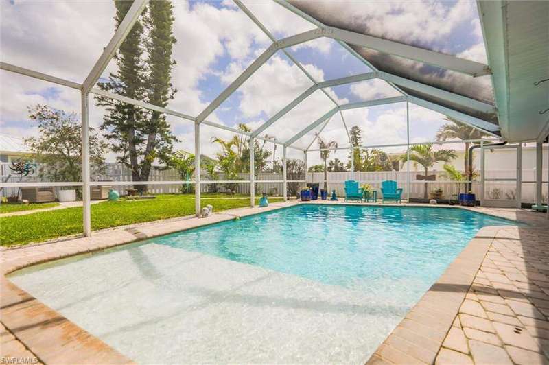 View of swimming pool featuring a lanai, a patio, a fenced backyard, and a fenced in pool