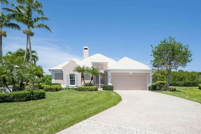 View of front facade featuring an attached garage,