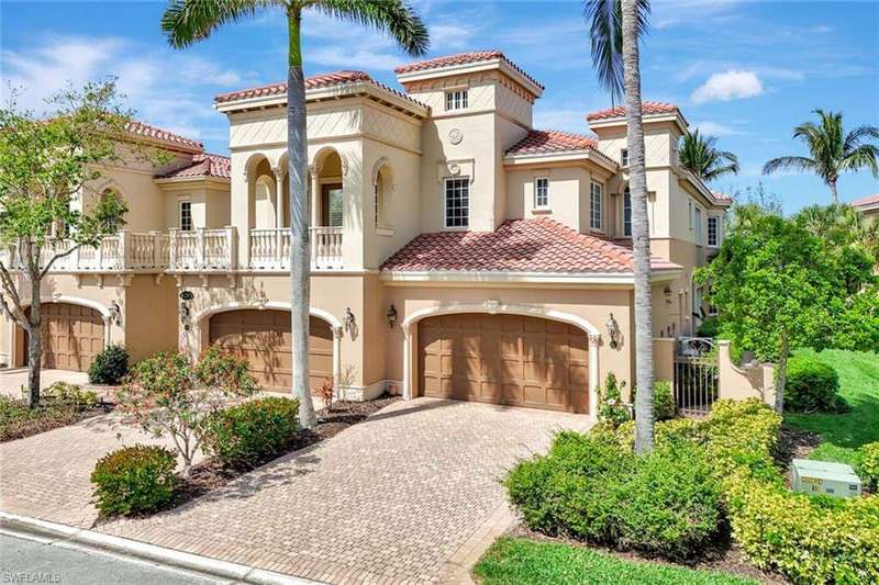 Mediterranean / spanish-style house featuring a garage, a tile roof, stucco siding, and decorative driveway