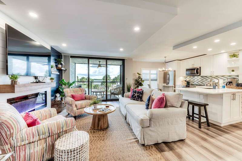 Aerial view of a nearby body of water and a pool area