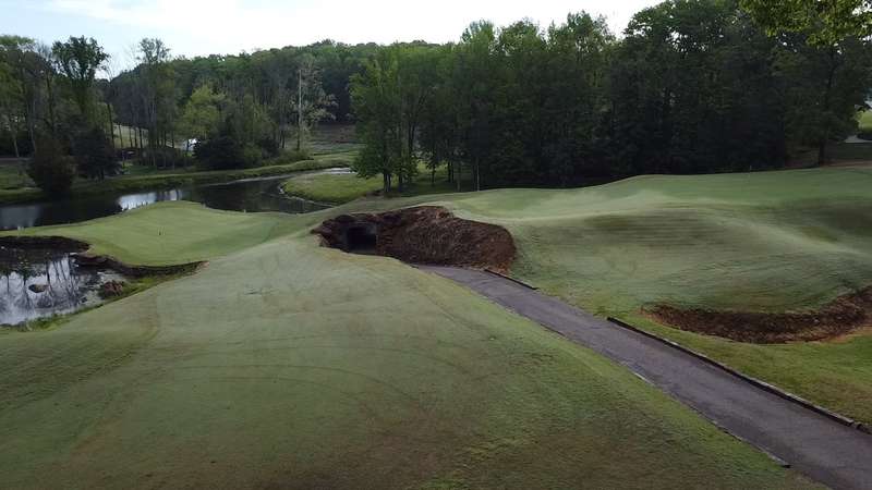 view of hole 10 s green and the lake to the left