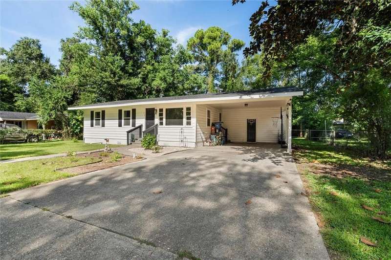 Perfect little house in Saraland with a brand new roof and updated interior, plus covered parking!