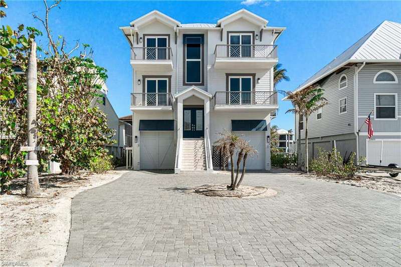 Excellent curb appeal from this bay front home. Enjoy the access to the bay from your boat dock or walk across the street to the Gulf of America.