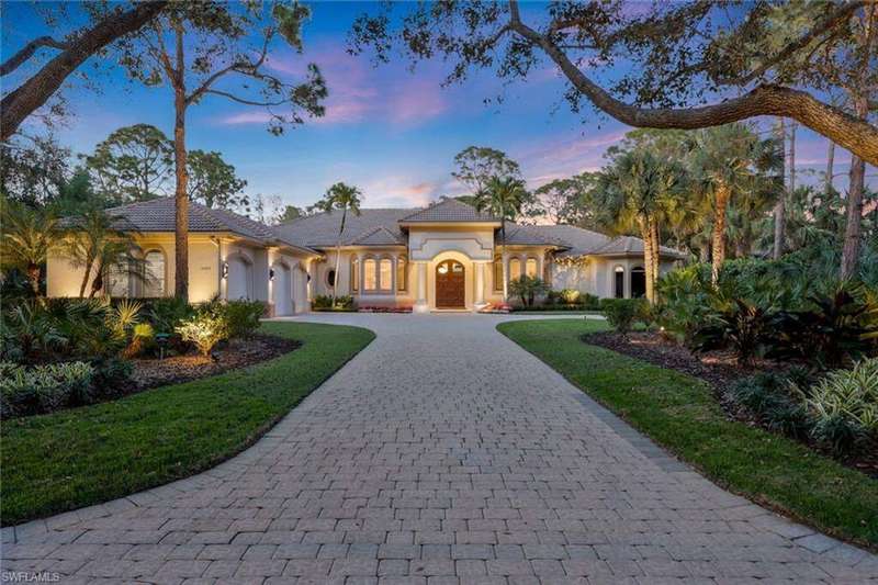 Sprawling Standout Estate Illuminated at Twilight