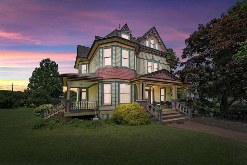 Evening view of front facade